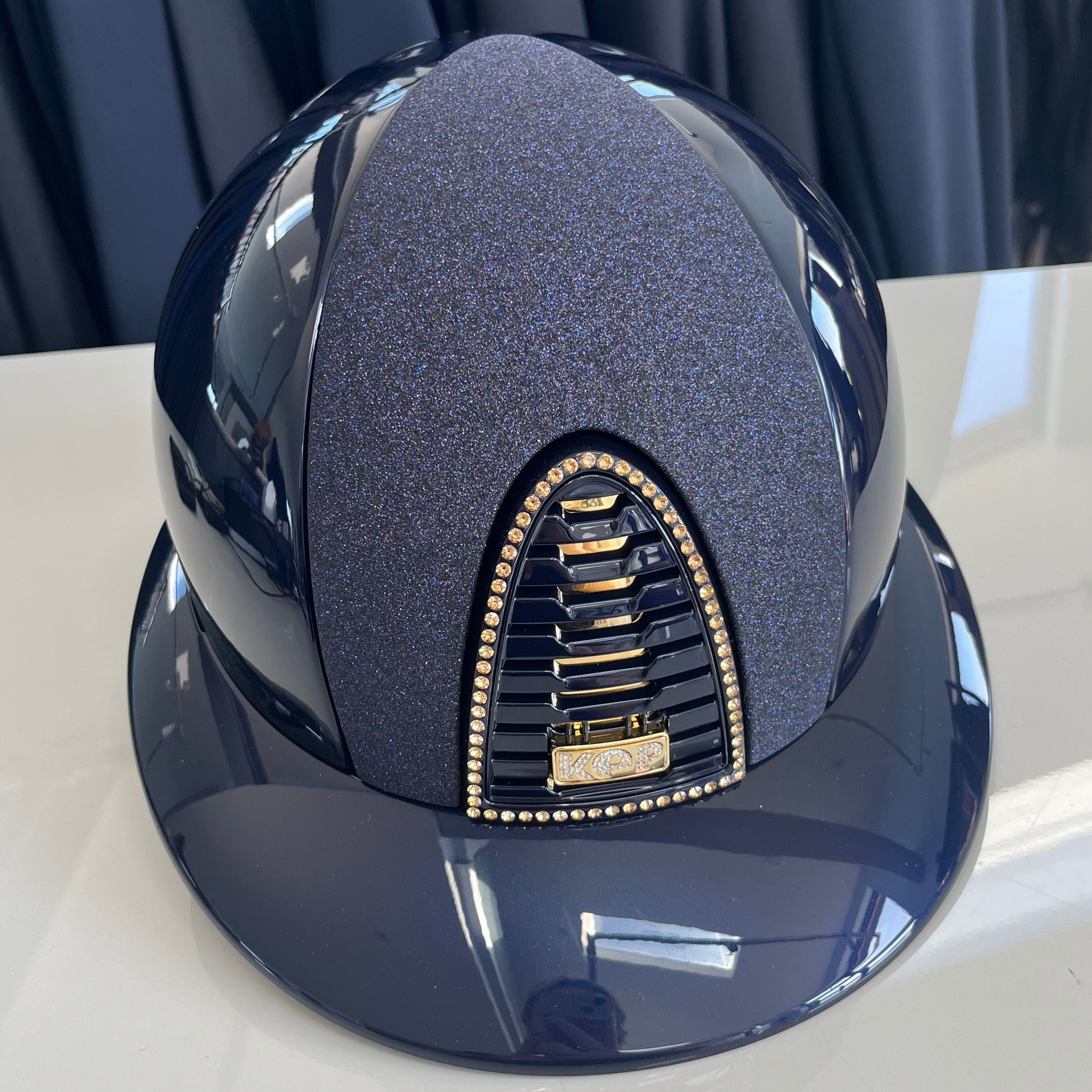 Kep Cromo2 Blue polish polo peak with crystal star fabric front, gold champagne crystal frame and glitter logo M- in stock and ready to ship!
