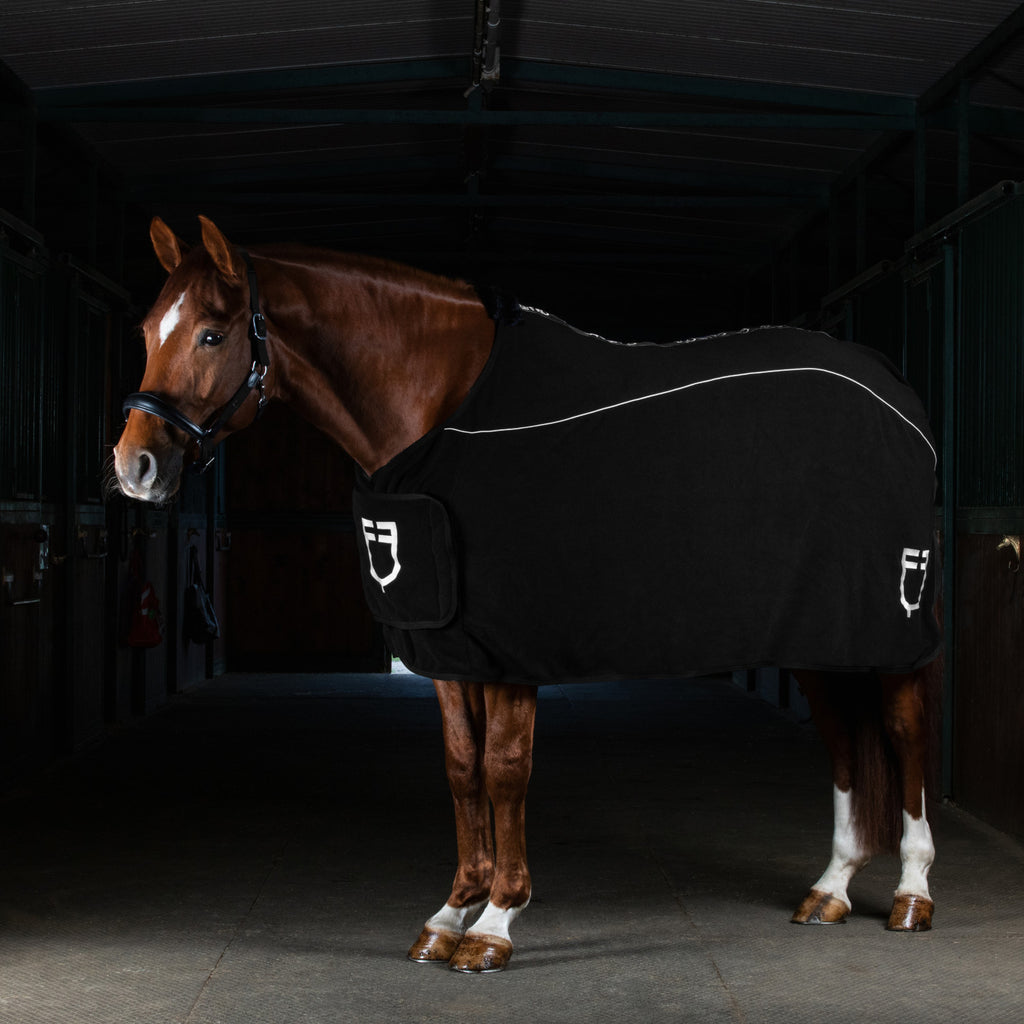 Fleece rug with flap front closure