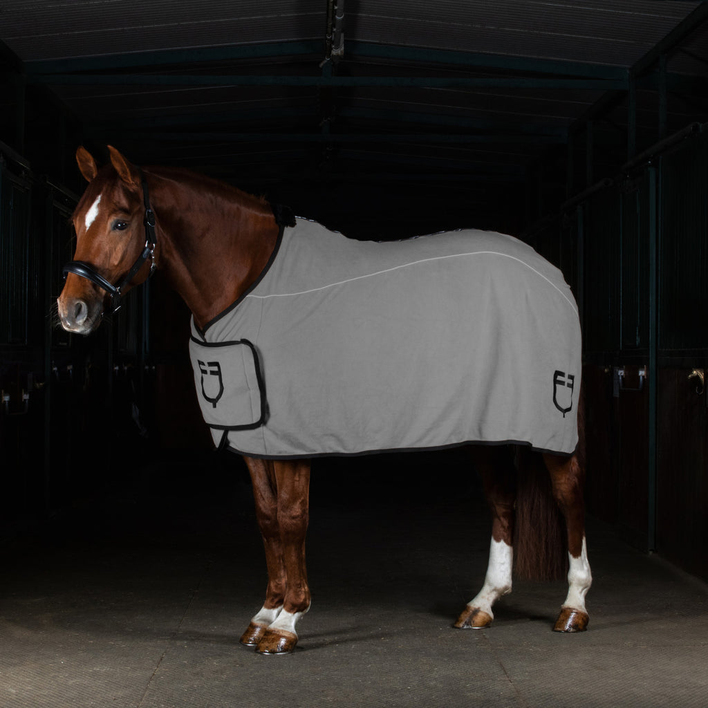 Fleece rug with flap front closure
