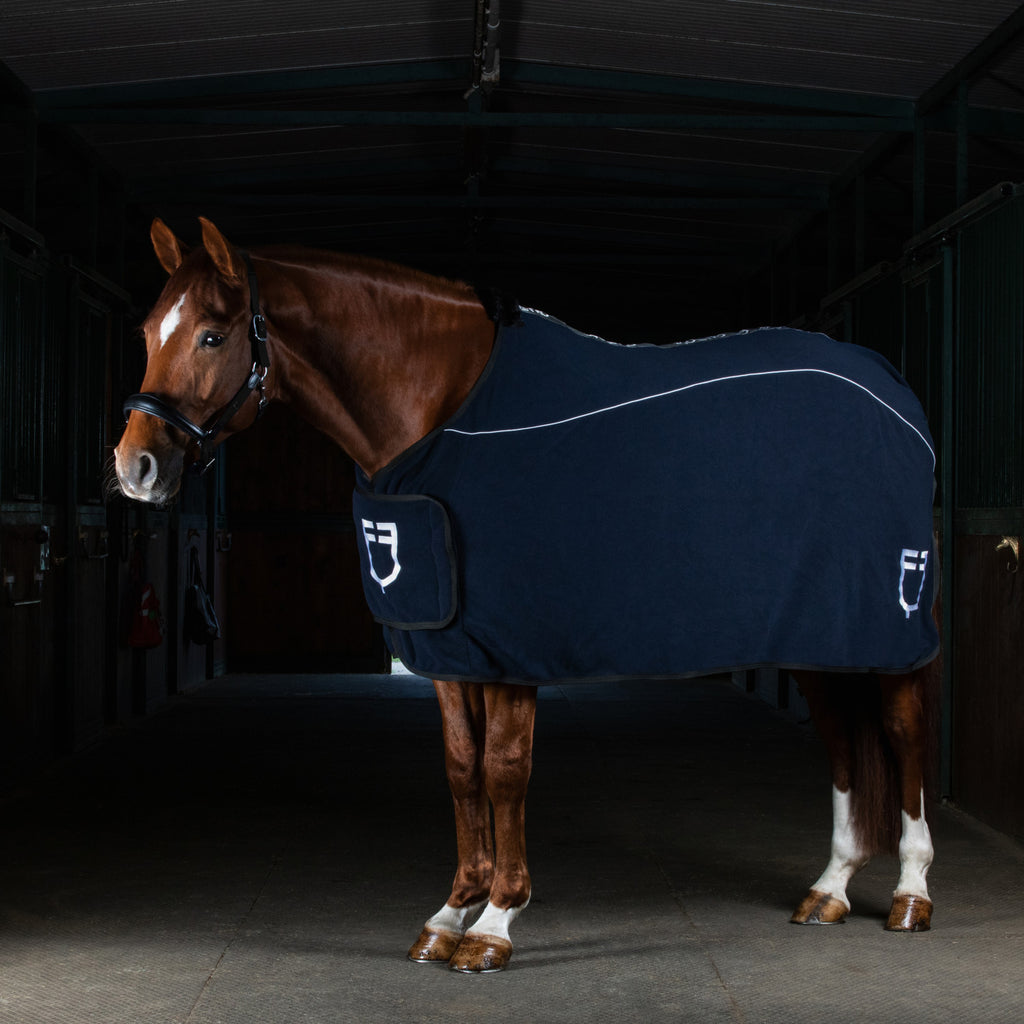 Fleece rug with flap front closure