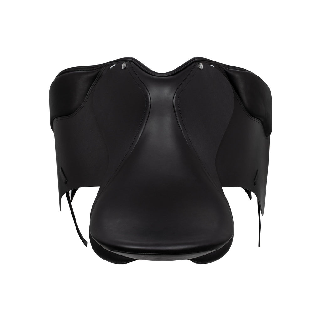 Dressage saddle with removable blocks