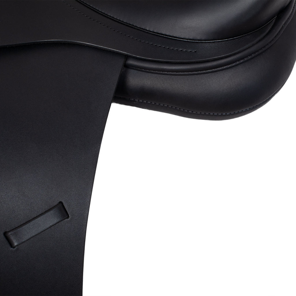 Dressage saddle with removable blocks