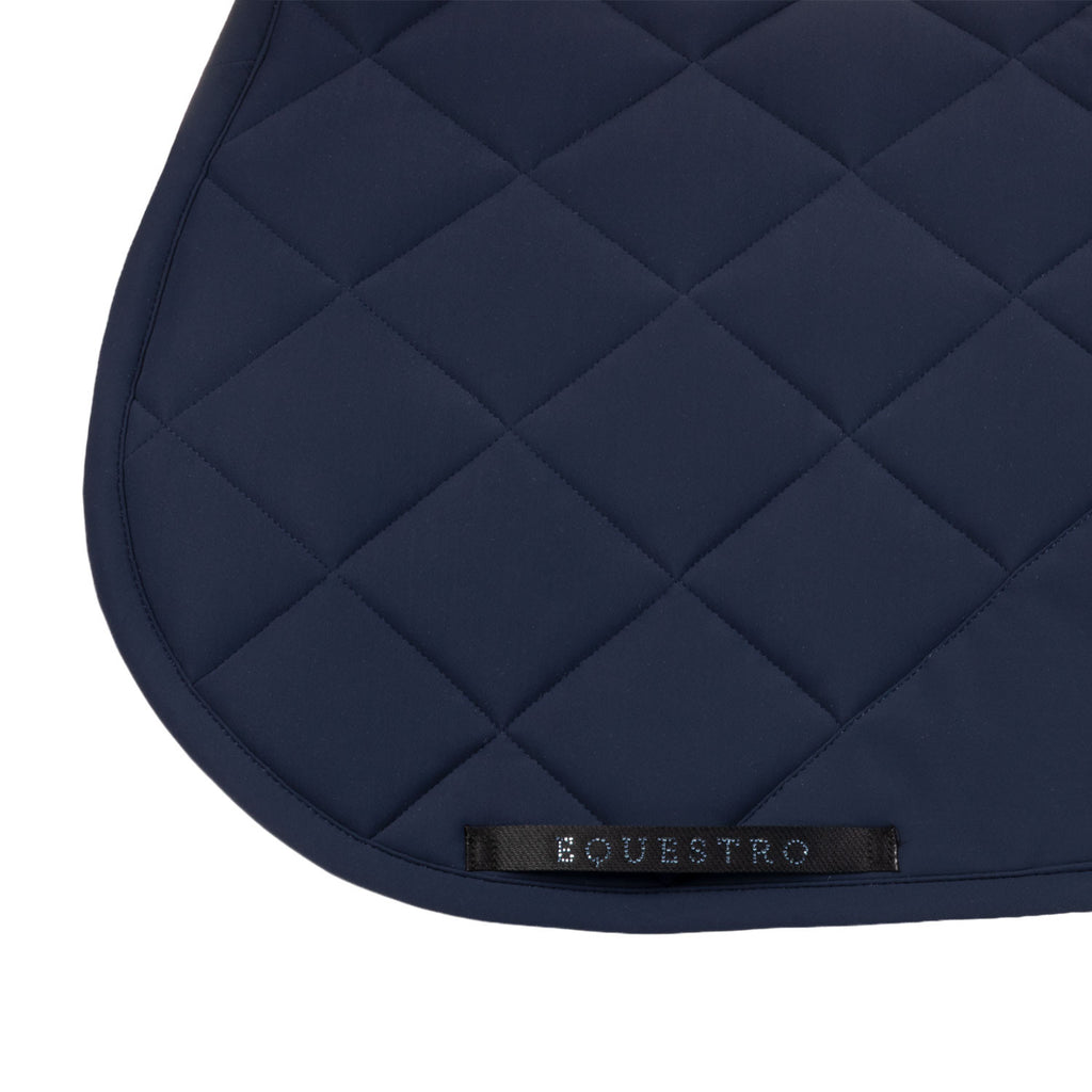 Jumping saddle pad with rhinestone logo