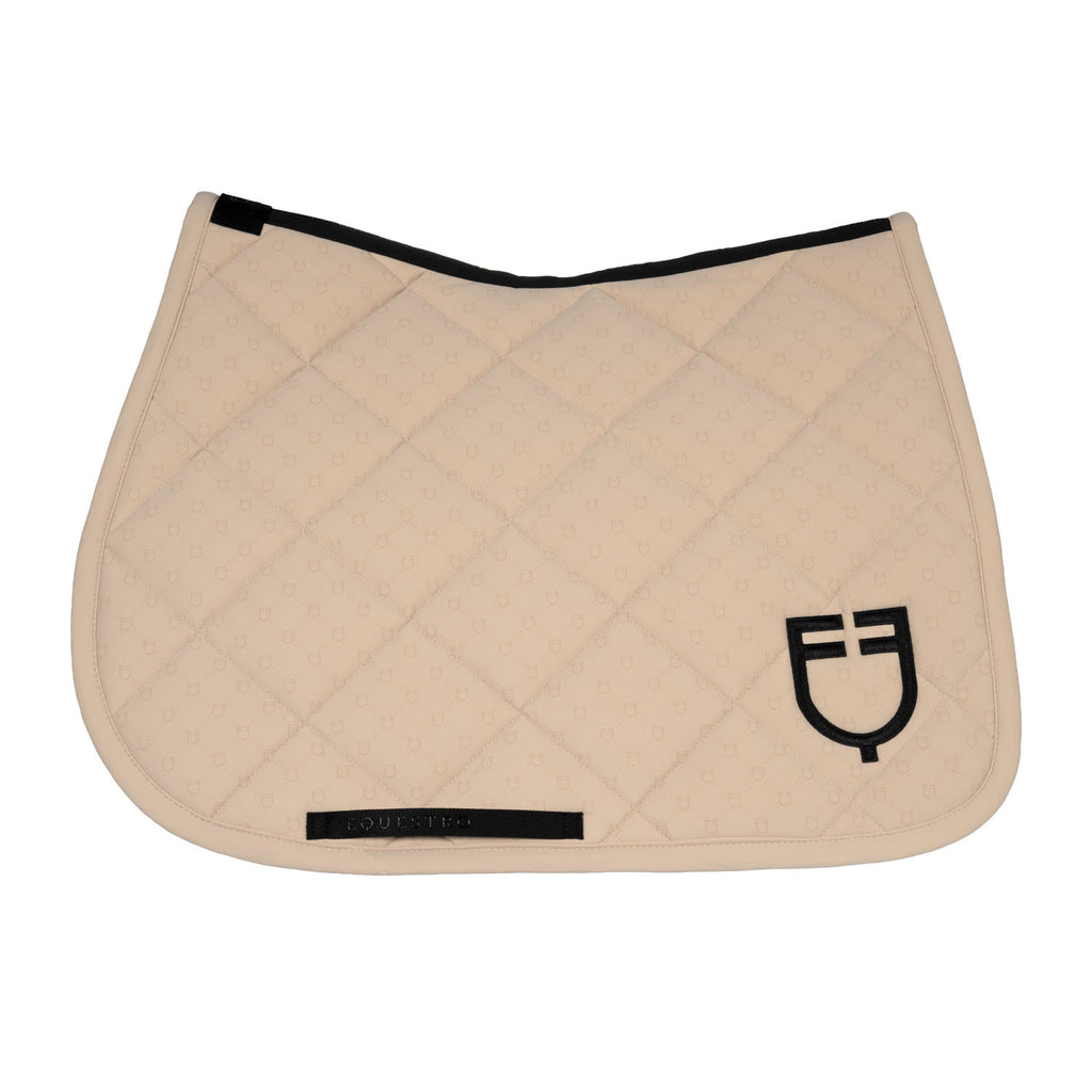 Jumping saddle pad with monogram print
