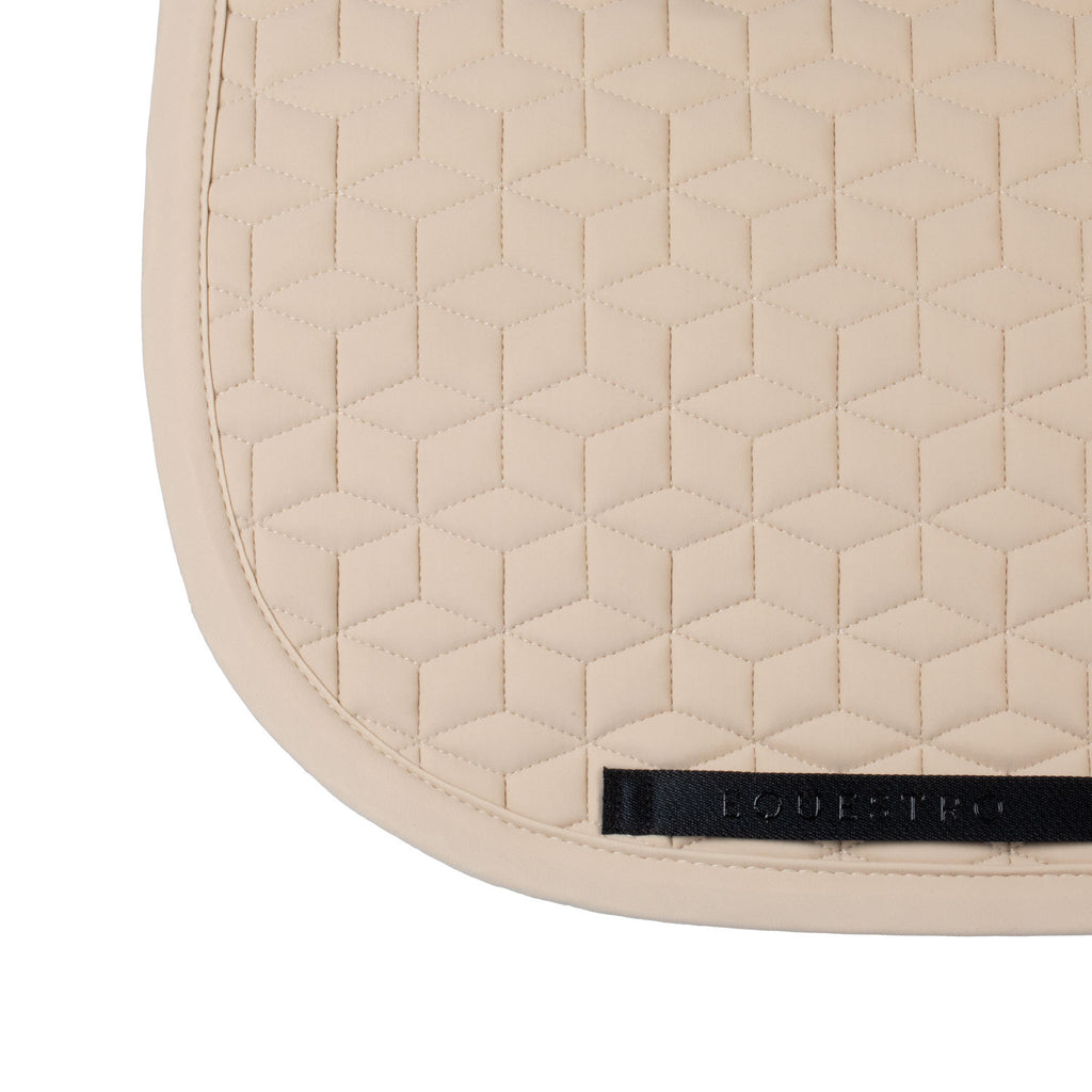 Dressage saddle pad with cube quilting