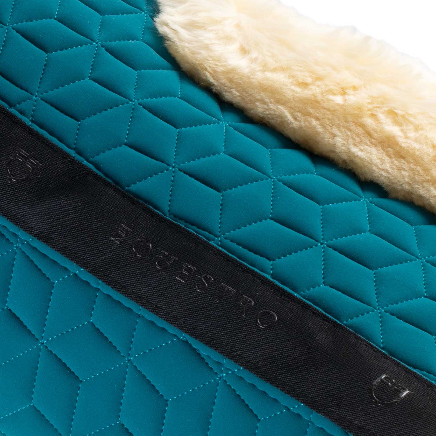 Technical fabric pad with sheepskin