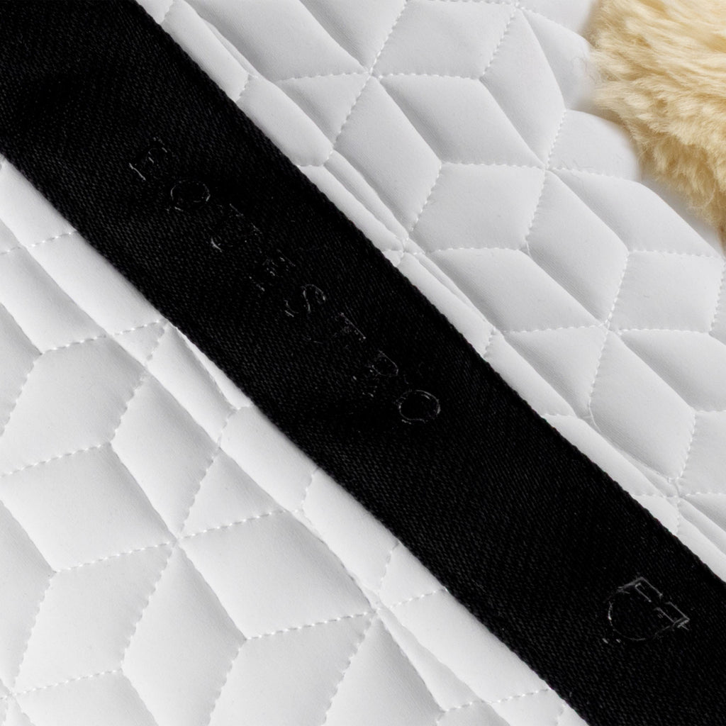 Technical fabric pad with sheepskin