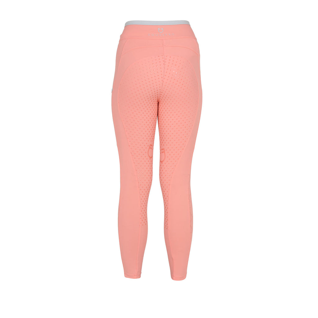Girls' leggings with perforated decorations