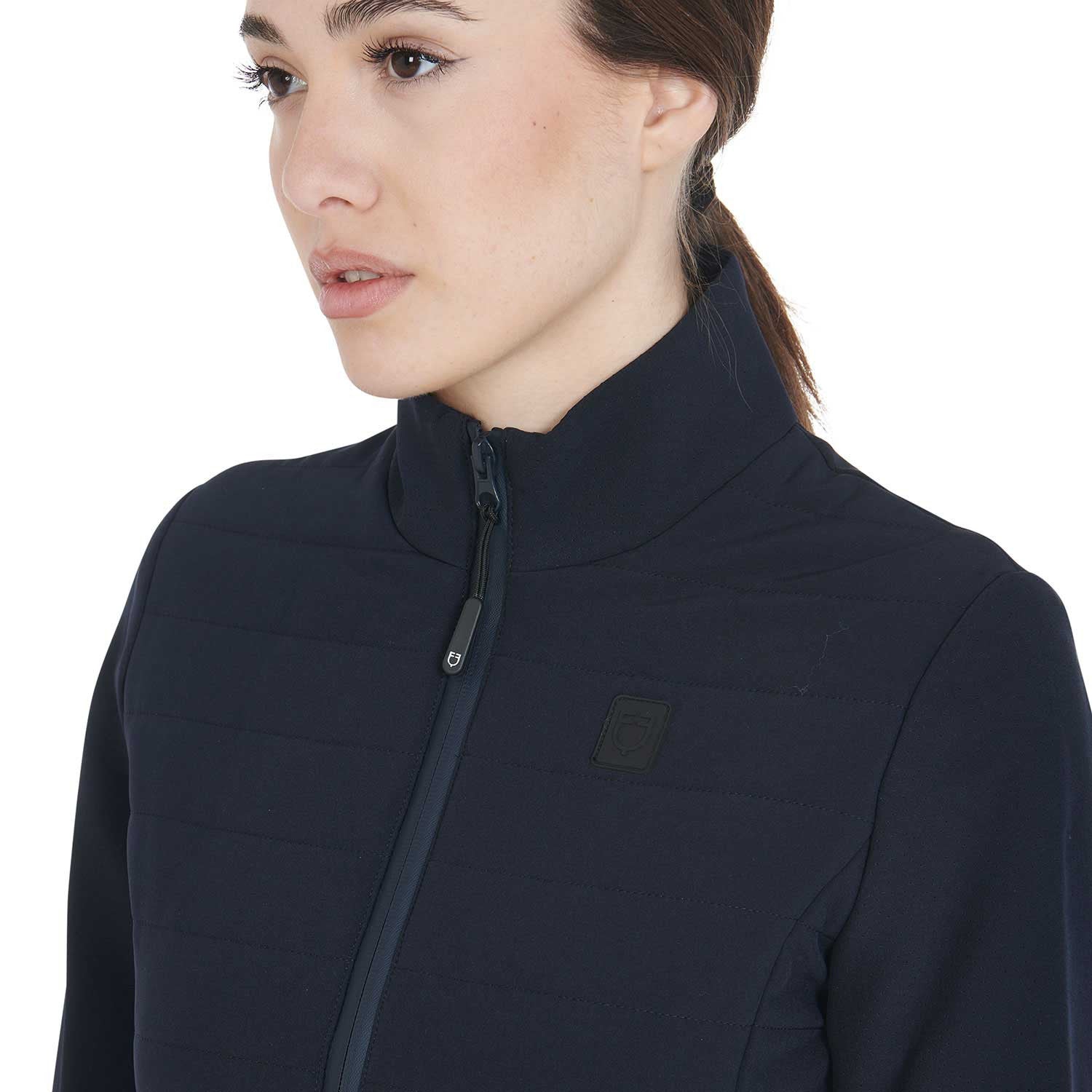 Women's jacket in technical and perforated fabric