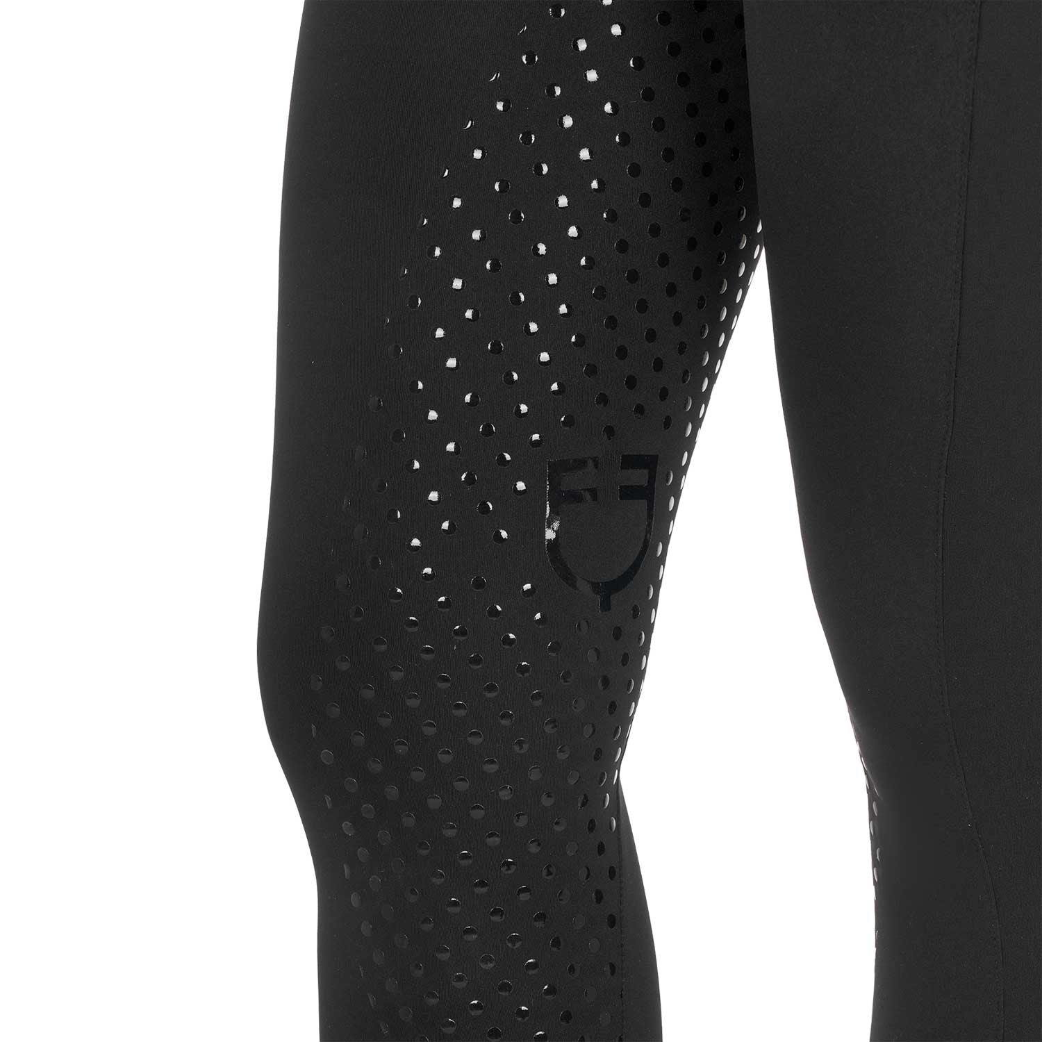 Women's leggings with perforated decorations